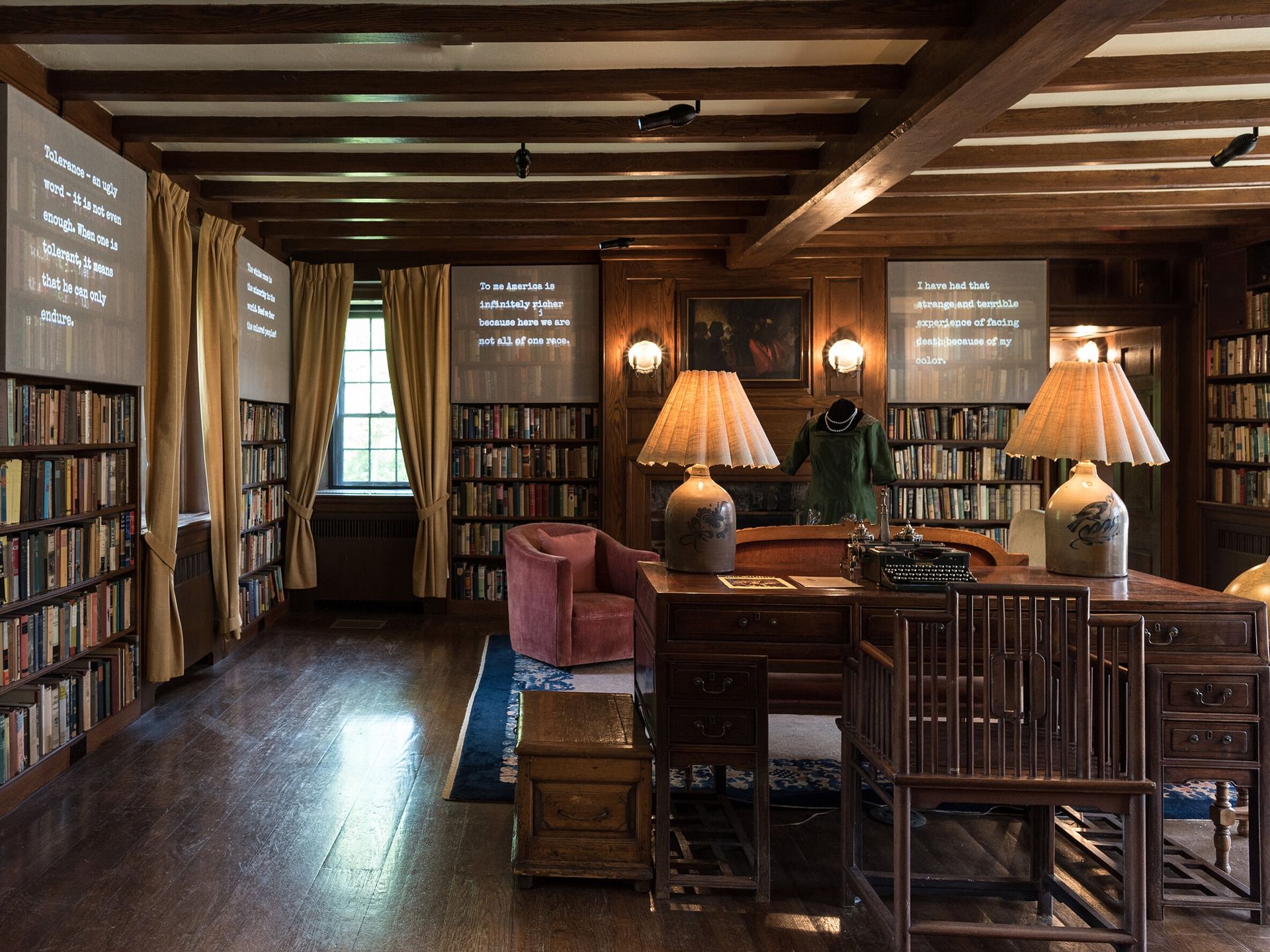 Projected text above several shelves in a room