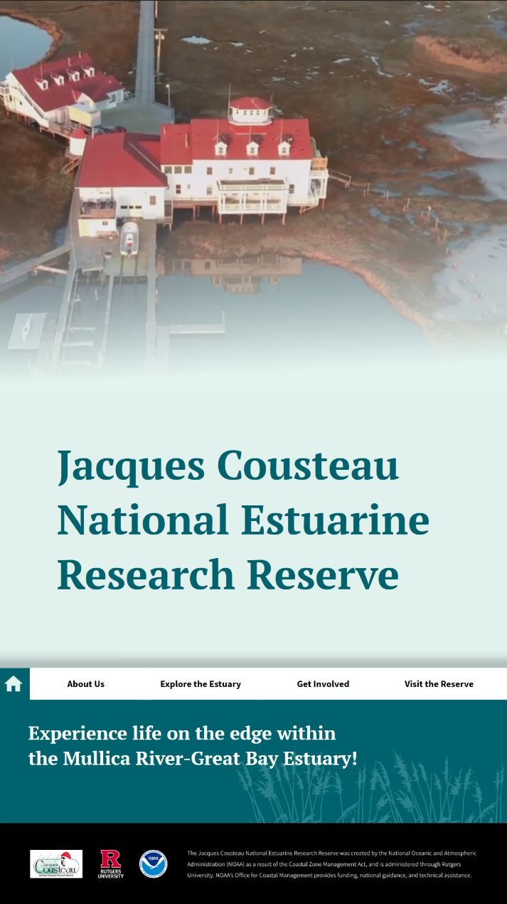 an informational kiosk screen showing a building in a marsh, the title says "Jacques Cousteau National Estuarine Research Reserve"