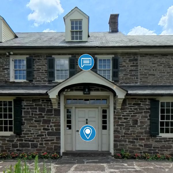 the exterior of the Pearl S Buck international house with two UI icons displayed on top